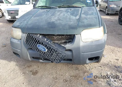 2004 Ford Escape Xlt z USA, uszkodzony, nr VIN 1FMYU03124KA46852